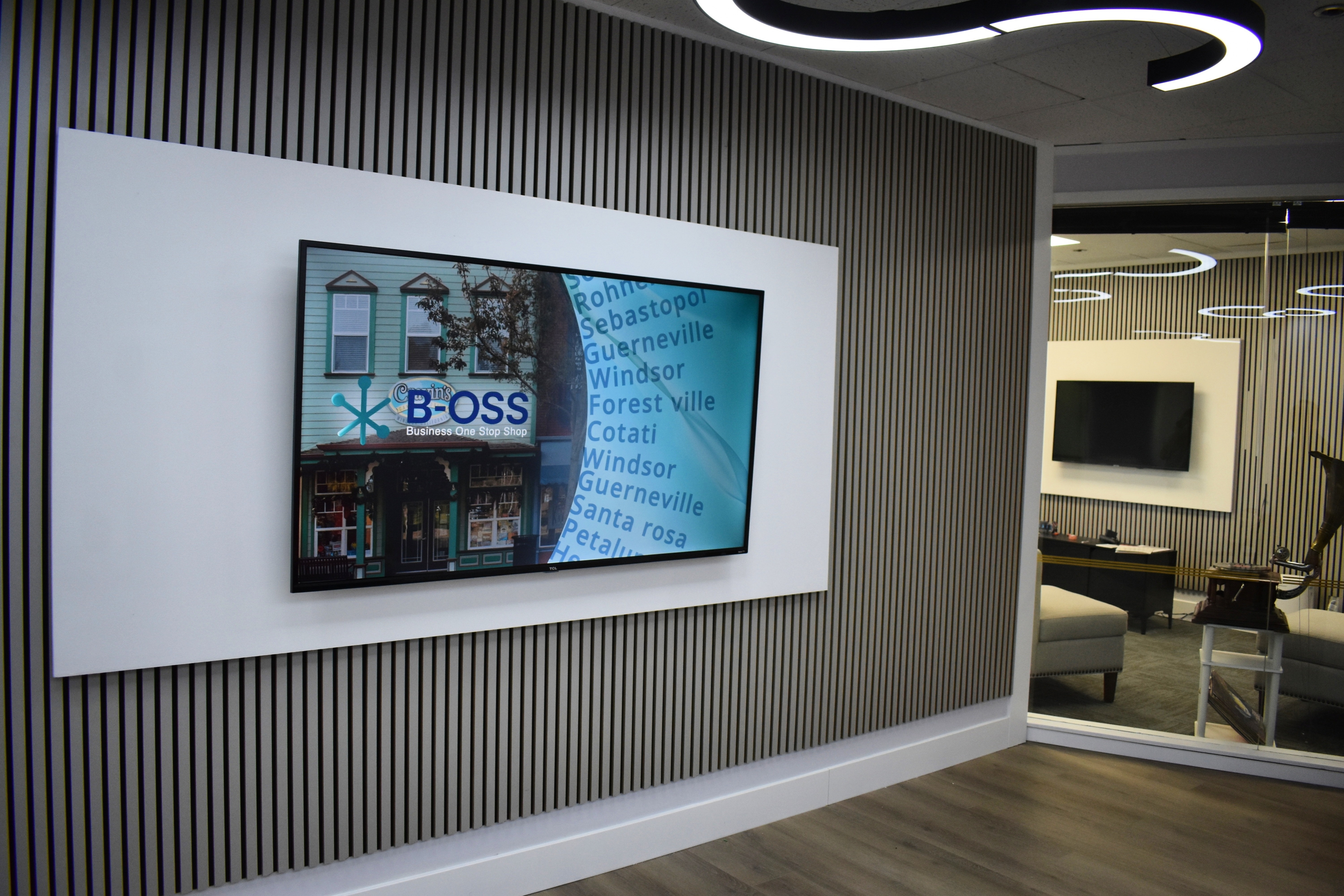 A screen with information welcomes clients to the second floor...