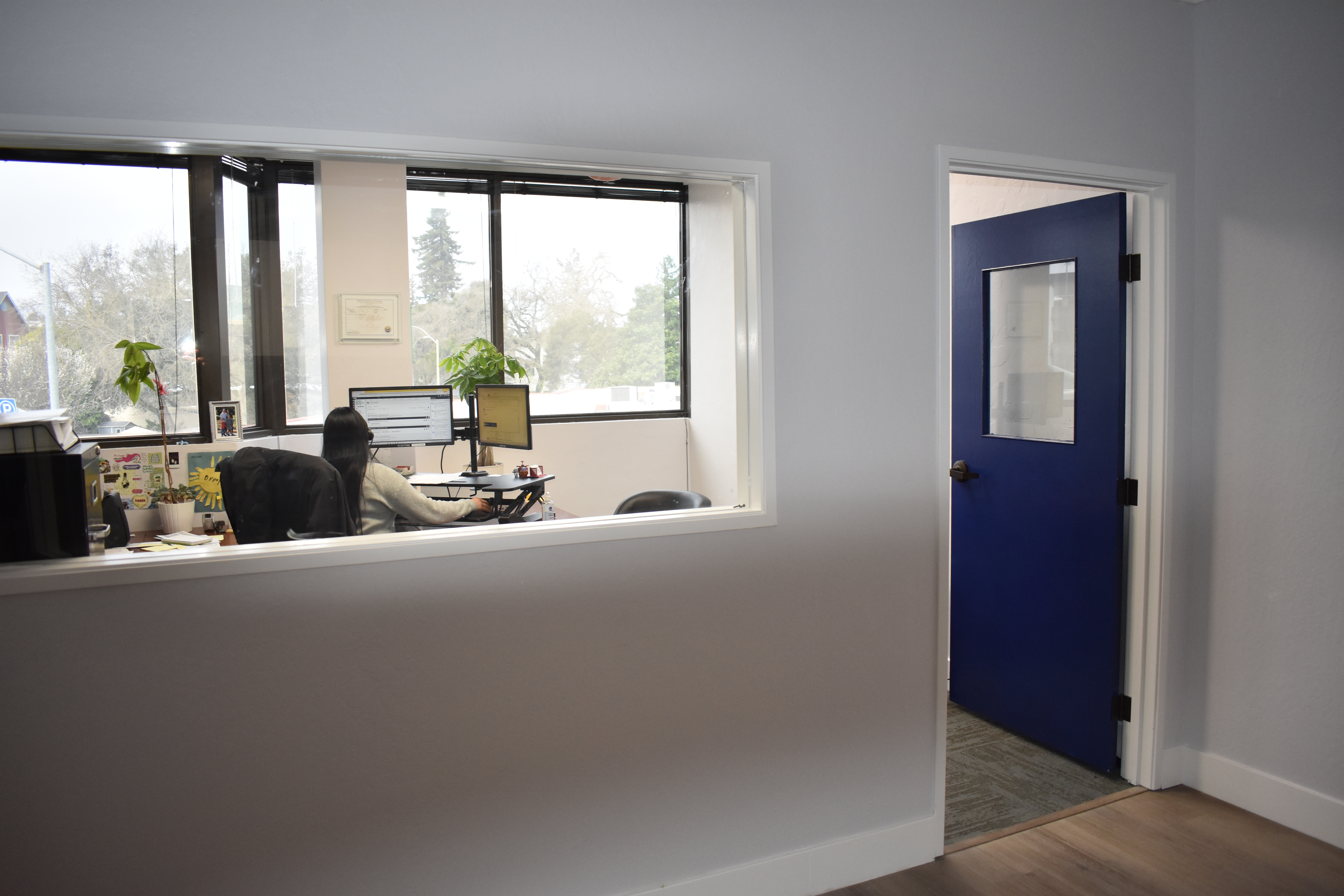 A worker taking calls at Trejo Insurances offices on the...