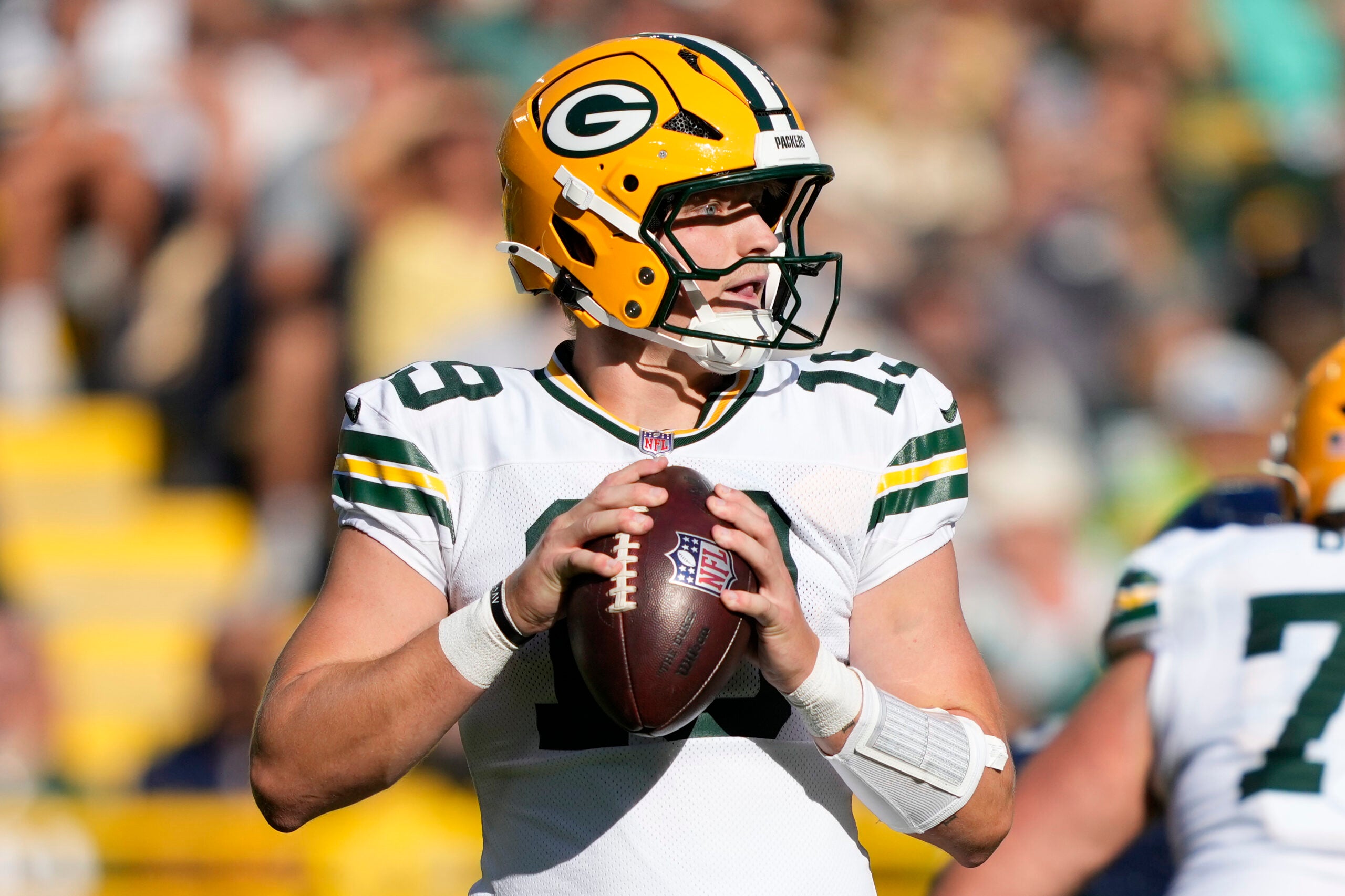Aug 23, 2025; Green Bay, Wisconsin, USA; Green Bay Packers quarterback Taylor Elgersma (19) throws against the Seattle Seahawks during the second half at Lambeau Field.