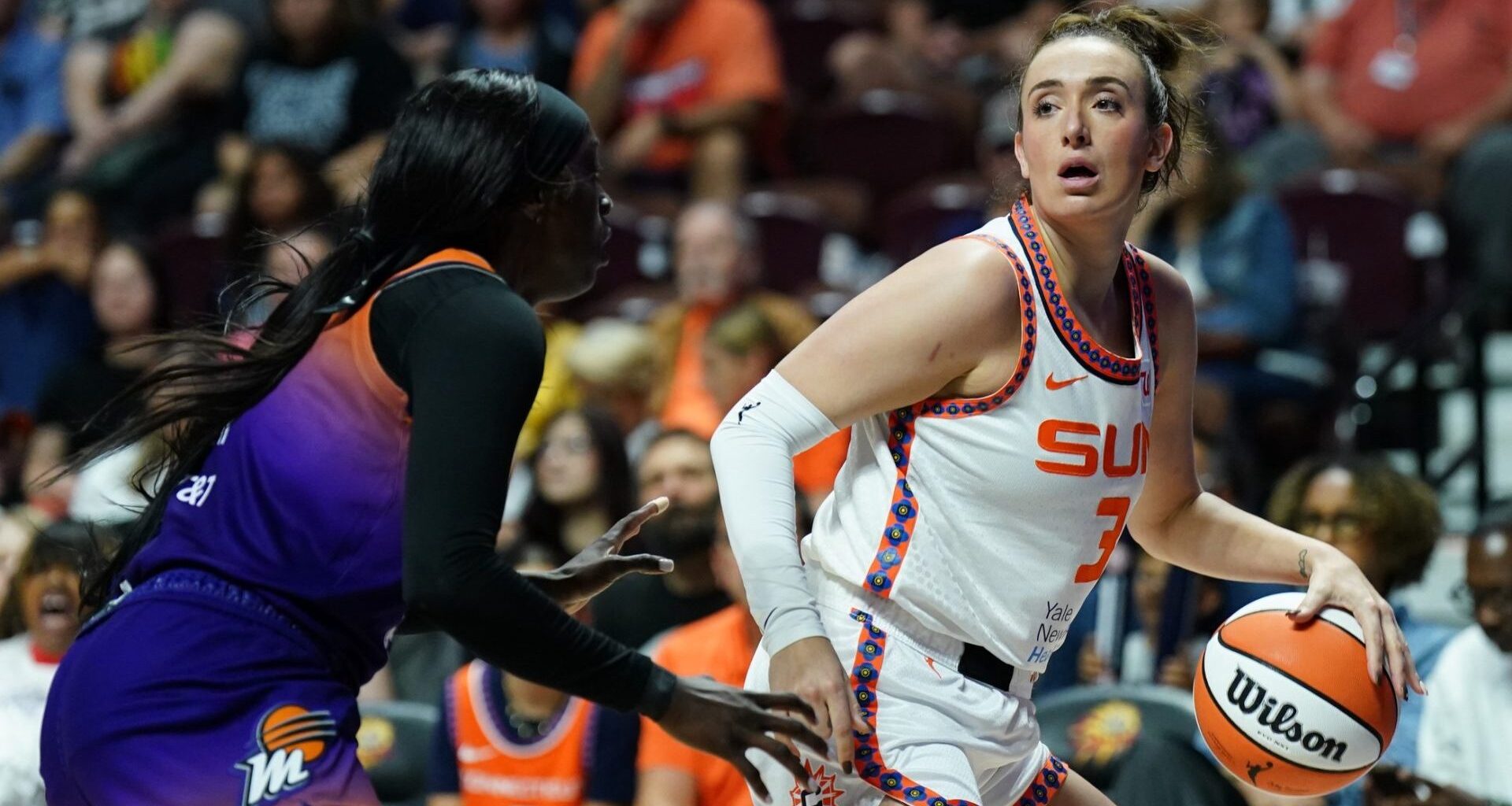 Sep 6, 2025; Uncasville, Connecticut, USA; Connecticut Sun guard Marina Mabrey (3) looks for an opening sgasindt Phoenix Mercury guard Kahleah Copper (2) in the first half at Mohegan Sun Arena.