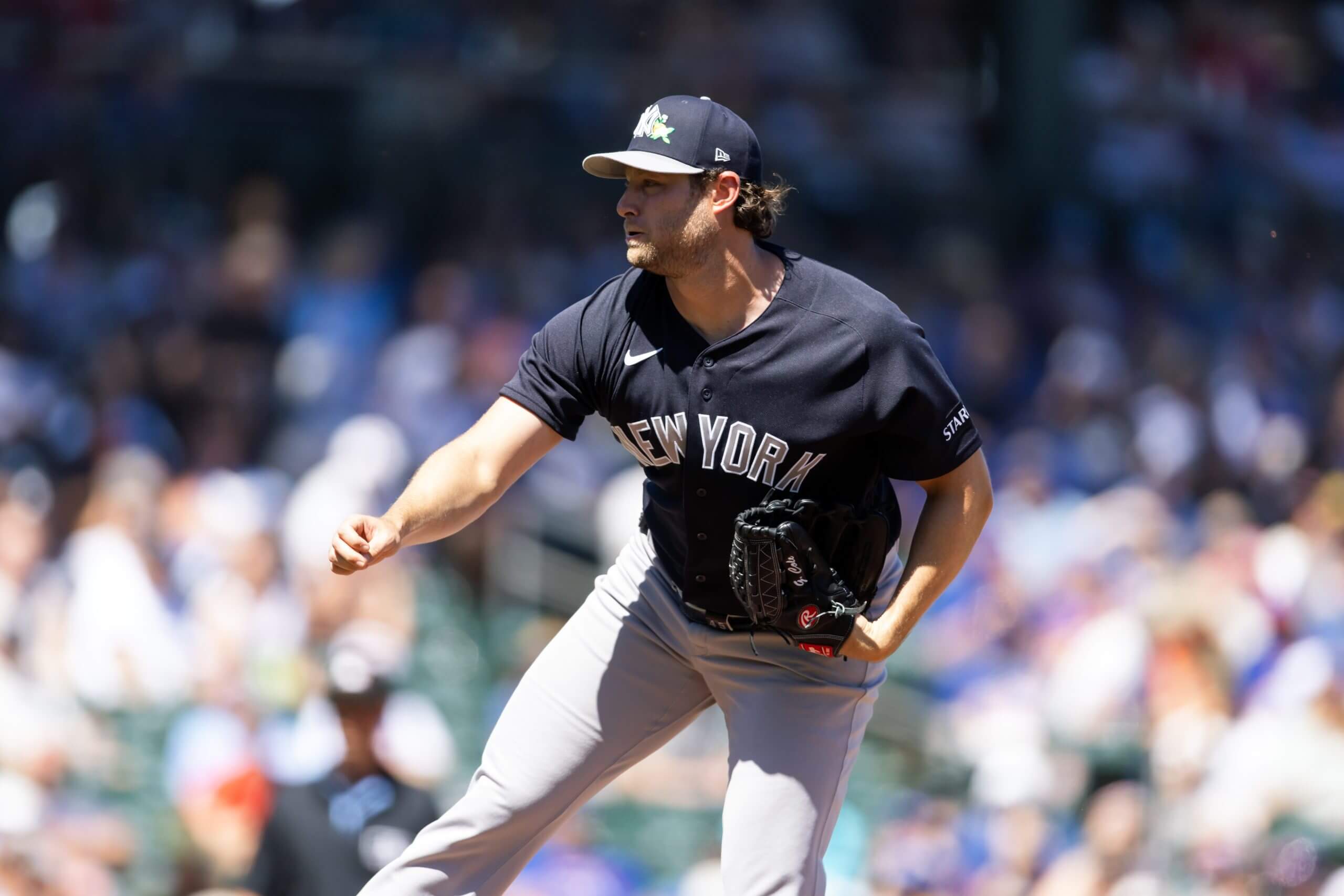 Gerrit Cole pitches against the Cubs during spring training.