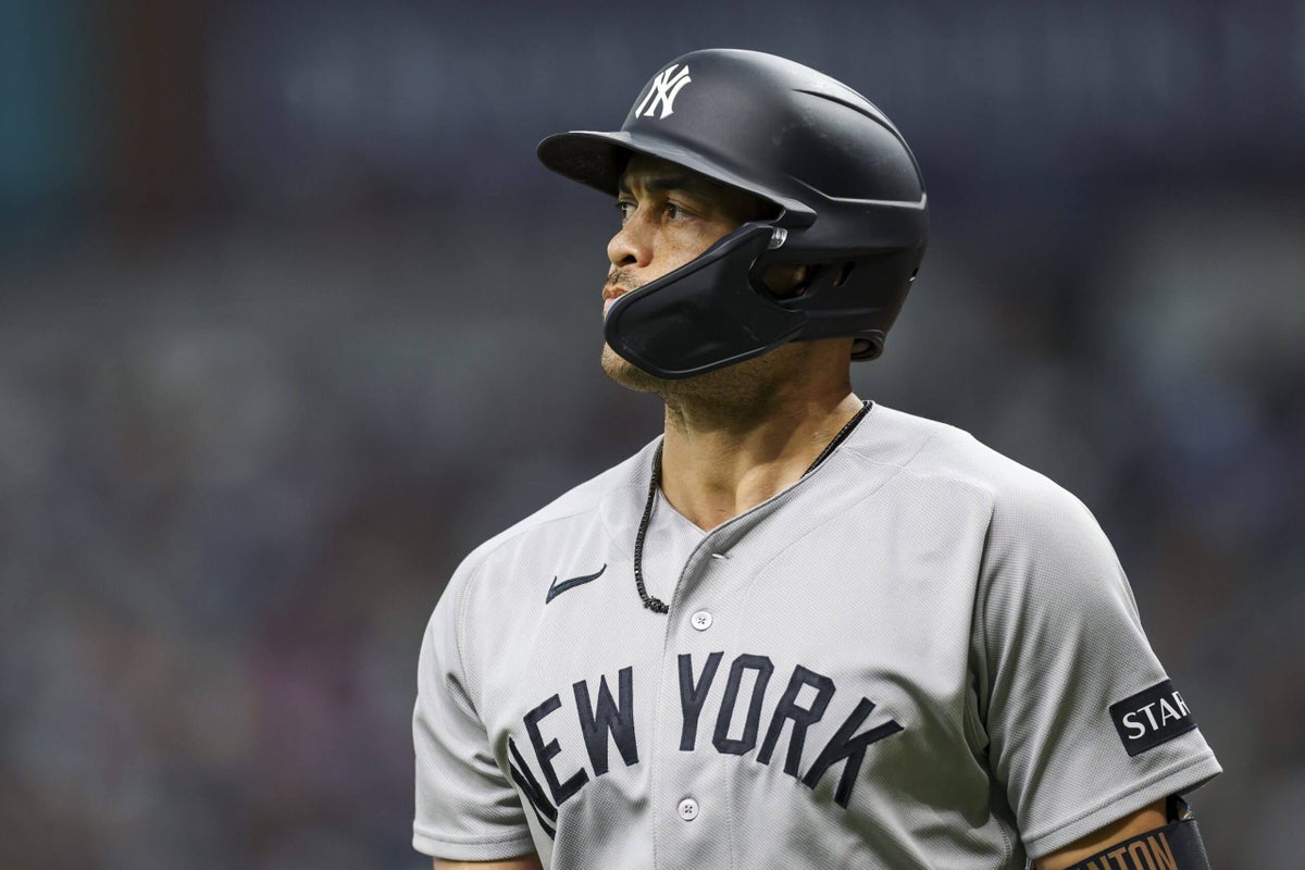 Giancarlo Stanton hurts calf, Aaron Boone says it’s ‘too early’ for concern