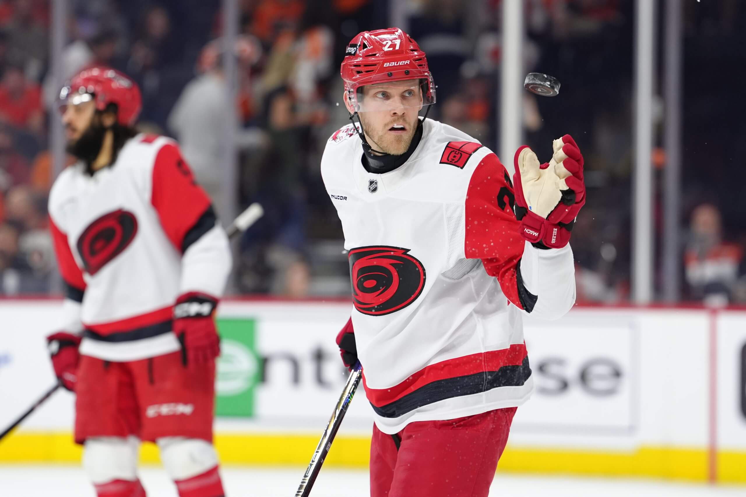 Carolina Hurricanes left wing Nikolaj Ehlers tosses the puck.