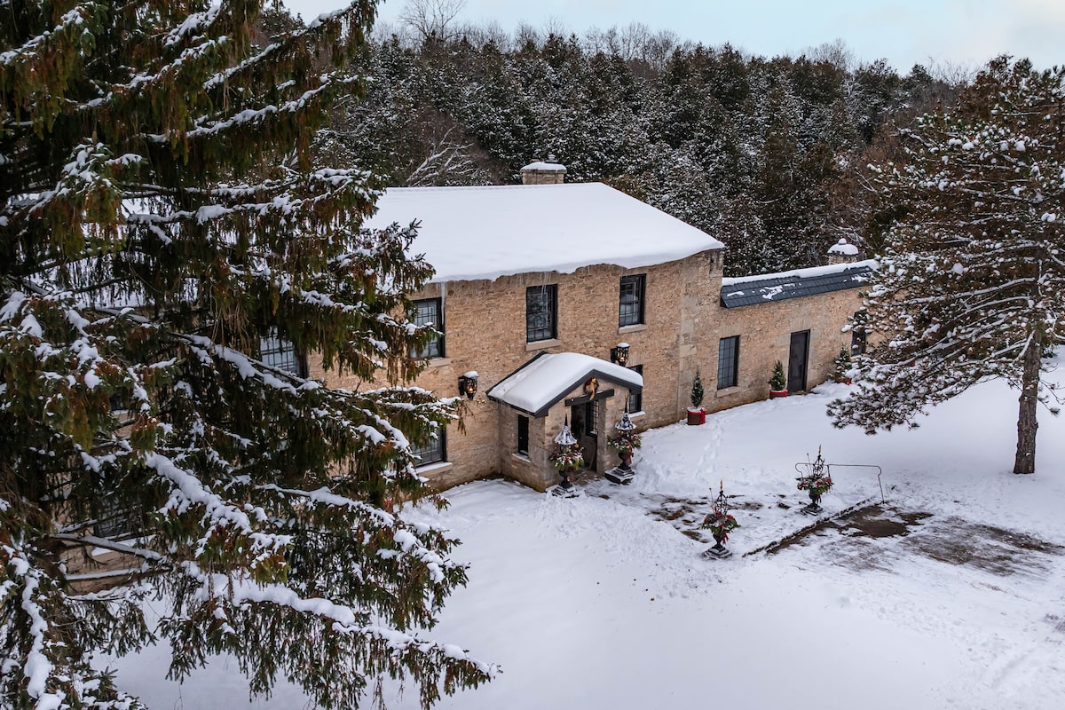 Restored mill home made of blocks chiselled from the river gorge