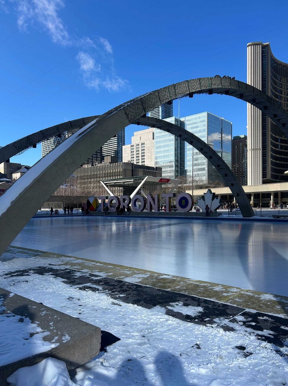 A Toronto sign next to an ice rink.