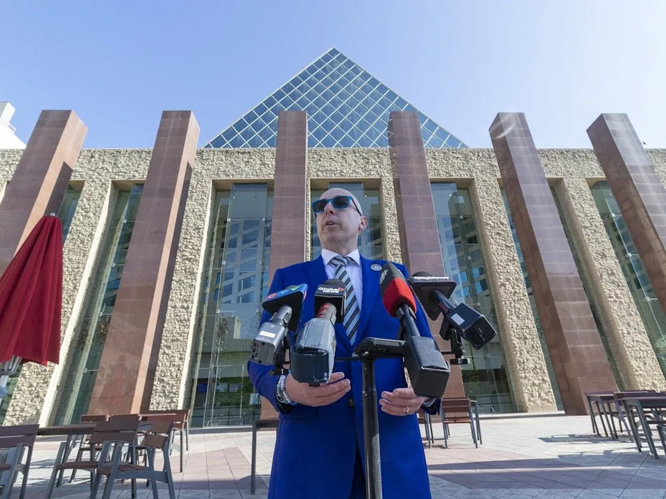  Andrew Knack, then a mayoral candidate, holds a news conference in June 2025 outside city hall in Edmonton.