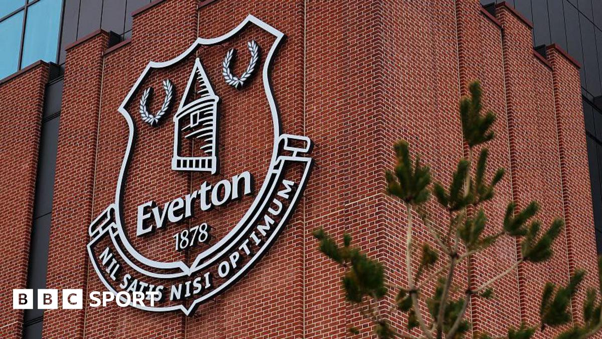 An Everton emblem seen on the exterior of the Hill Dickinson Stadium before the Premier League match between Everton and Tottenham Hotspur at Hill Dickinson Stadium