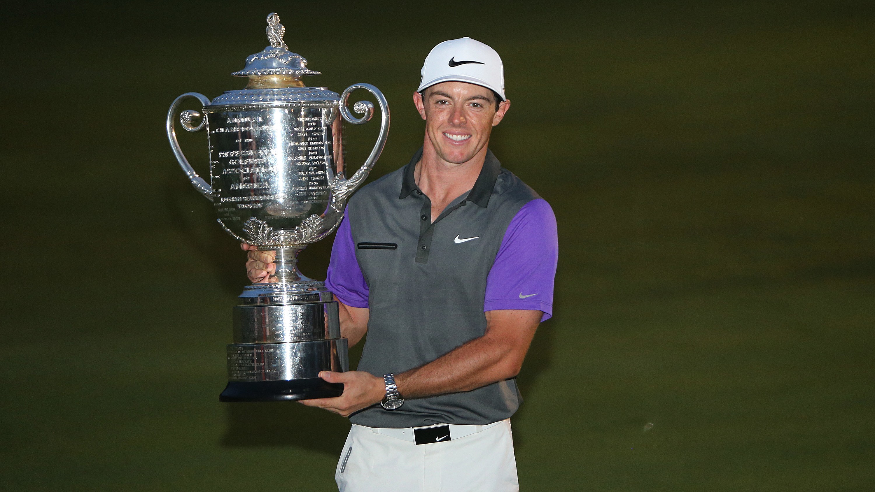 Rory McIlroy poses with the trophy after winning the 2014 PGA Championship