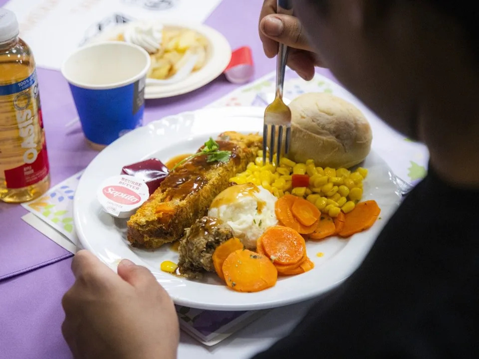  Monia Bikai enjoyed the turkey dinner Sunday.