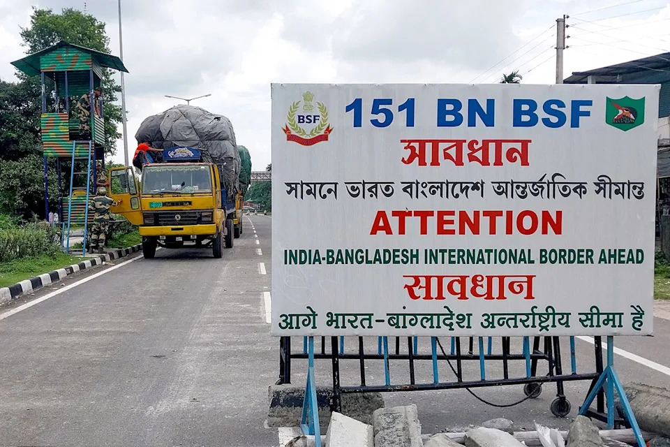 Border Security Force (BSF) personnel inspect a truck carrying supplies to Bangladesh at the India-Bangladesh border on August 7, 2024Credit: DIPTENDU DUTTA/AFP via Getty