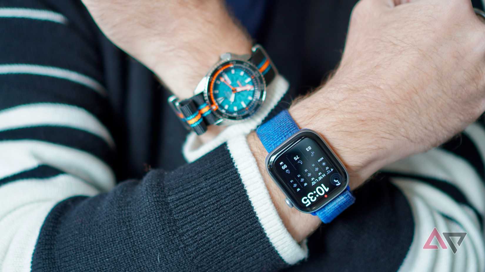 A person wearing a normal watch and an Apple Watch Series 11