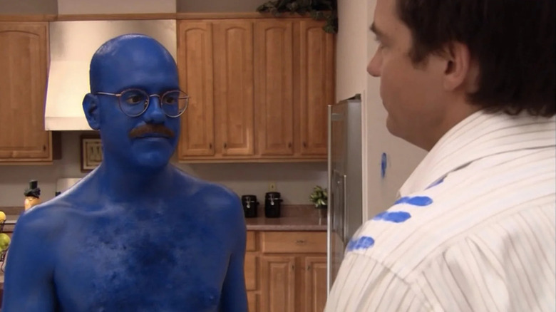 Tobias covered in blue staring at Jason Bateman as Michael