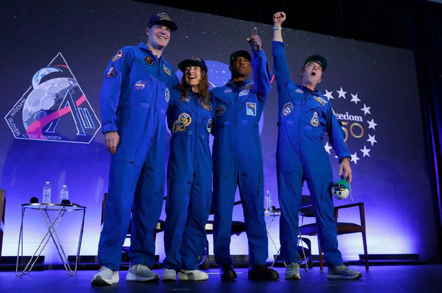 The Artemis II crew (from left) Jeremy Hansen, Christina Koch, Victor Glover and Reid Wiseman come to centre stage at the end of a crew return event on Saturday, April 11, 2026, at Ellington Field in Houston.