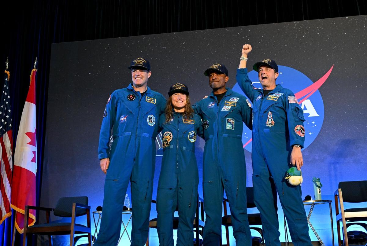 NASA astronauts Reid Wiseman, commander; Victor Glover, pilot; Christina Koch, mission specialist; and CSA (Canadian Space Agency) astronaut Jeremy Hansen, shared brief remarks with friends, family, and colleagues after they landed at Ellington Airport near NASA’s Johnson Space Center in Houston on Saturday, April 11, 2026