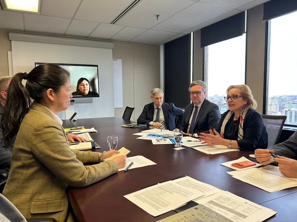 Manitoba Immigration Minister Malaya Marcelino, left, and Lena Metlege Diab, Canada's minister of immigration, refugees and citizenship, meet in Ottawa in April 2026.