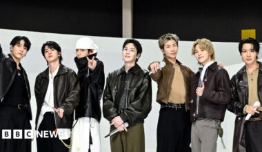 'Came back for what's mine': BTS brave pouring rain as they kick off $1bn world tour - BBC