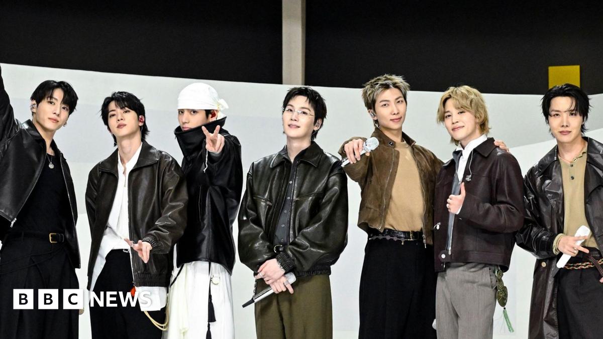 'Came back for what's mine': BTS brave pouring rain as they kick off $1bn world tour - BBC