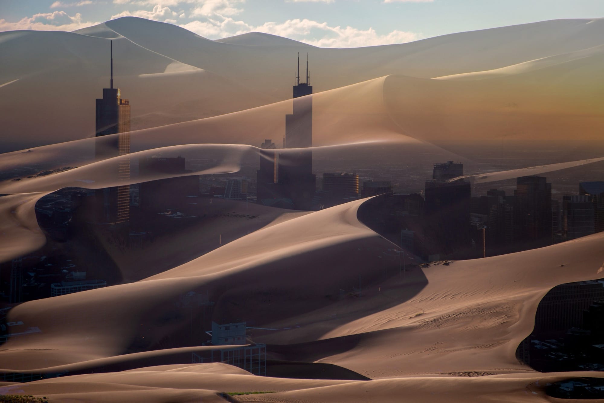 two photographs digitally superimposed, like a double-exposure, depicting sand dunes and the Chicago skyline