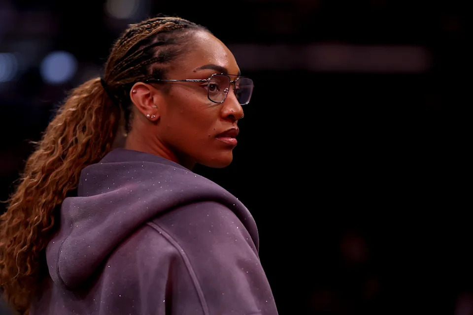HOUSTON, TEXAS - MARCH 21: A'ja Wilson looks on during the game between the Miami Heat and the Houston Rockets at Toyota Center on March 21, 2026 in Houston, Texas. NOTE TO USER: User expressly acknowledges and agrees that, by downloading and or using this photograph, User is consenting to the terms and conditions of the Getty Images License Agreement. (Photo by Kenneth Richmond/Getty Images)