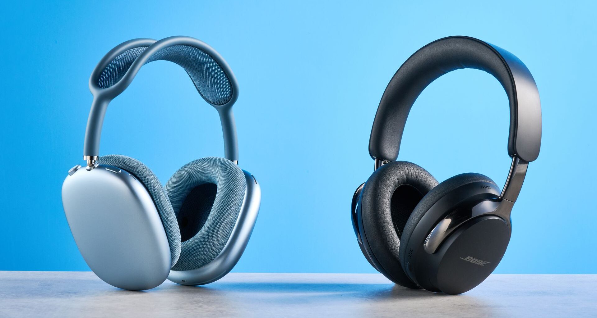 the bose quietcomfort ultra gen 2 headphones in black photographed on a blue tom's guide background
