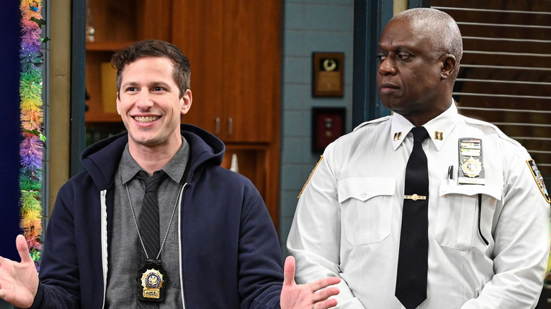 Jake Peralta and Raymond Holt standing next to each other in Brooklyn Nine-Nine