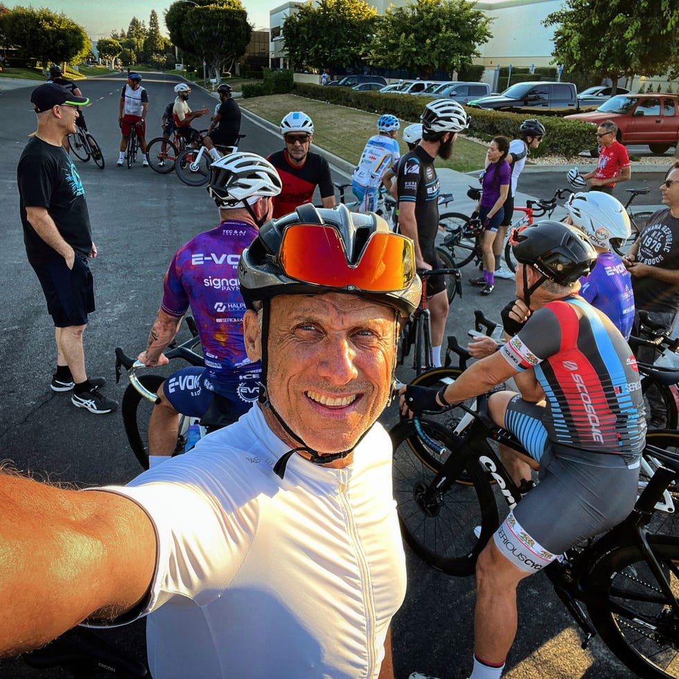Group of cyclists gathered on the street Group of cyclists gathered on the street