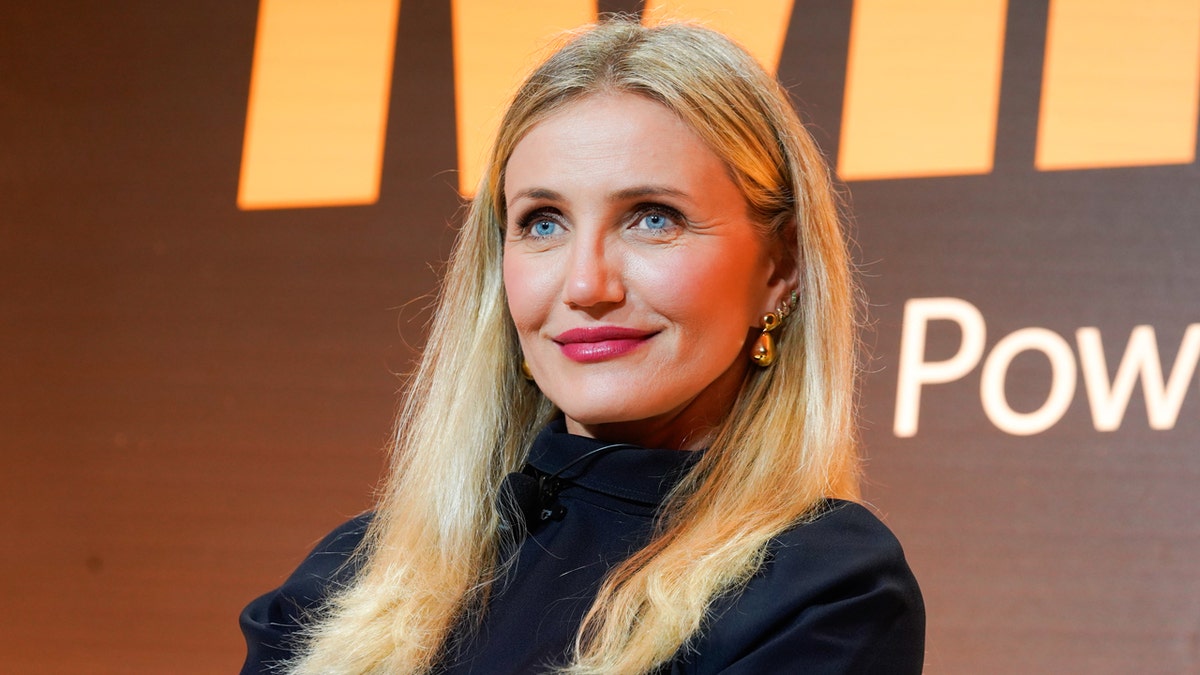 Cameron Diaz seated on a panel discussion