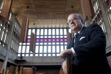 John Fraser, master of Massey College, poses in Ondaatje Hall on campus in Toronto on May 11, 2011.