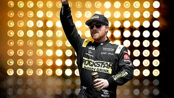 Tyler Reddick waves to fans during driver intros. (Photo by Sean Gardner/Getty Images)Photo by Sean Gardner/Getty Images