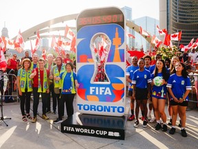 Toronto will host Canada's opening match on June 12. Above, Mayor Olivia Chow celebrates with soccer fans at the unveiling of the countdown clock at Nathan Phillips Square.