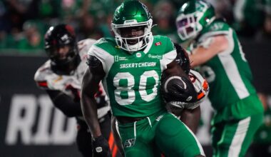 Saskatchewan Roughriders receiver Ajou Ajou (80) runs the football against the B.C. Lions during the first half of CFL football action in Regina, on Saturday, October 25, 2025.