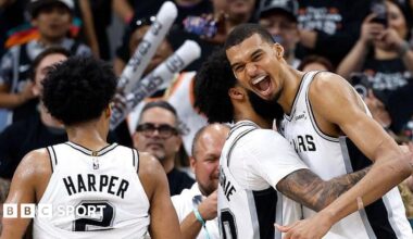 Julian Champagnie hugs Victor Wembanyama during the San Antonio Spurs' win over the Portland Trail Blazers in game four of their 2026 NBA play-off series