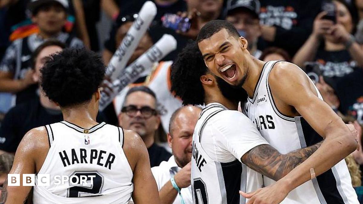 Julian Champagnie hugs Victor Wembanyama during the San Antonio Spurs' win over the Portland Trail Blazers in game four of their 2026 NBA play-off series