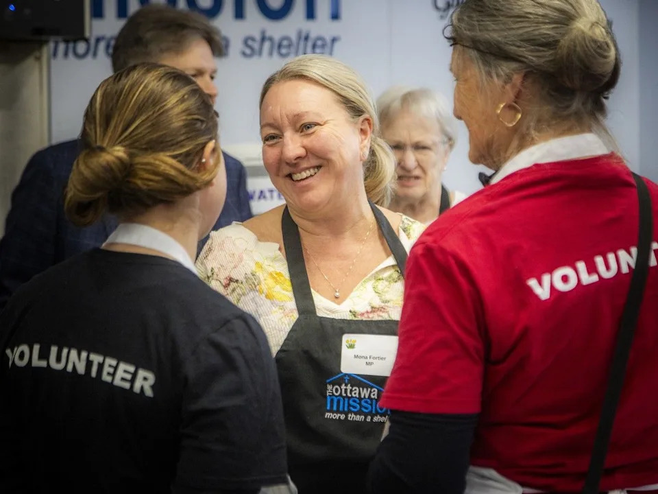  Liberal MP Mona Fortier chats with volunteers Sunday.