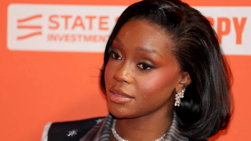 Indiana Fever guard Raven Johnson poses for a photo on the orange carpet before the 2026 WNBA Draft. Mandatory Credit&colon; Brad Penner-Imagn Images