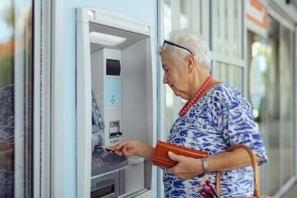 Person at an ATM.
