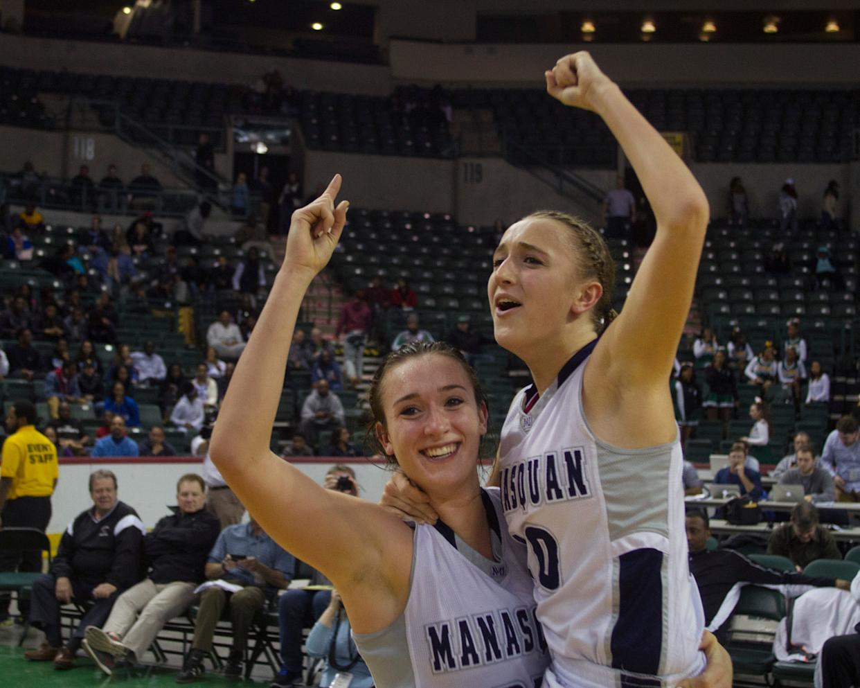 Manasquan sisters Marina and Dara Mabrey celebrate their Tournament of Champions victory over St Rose at Sun National Bank Center in Trenton.