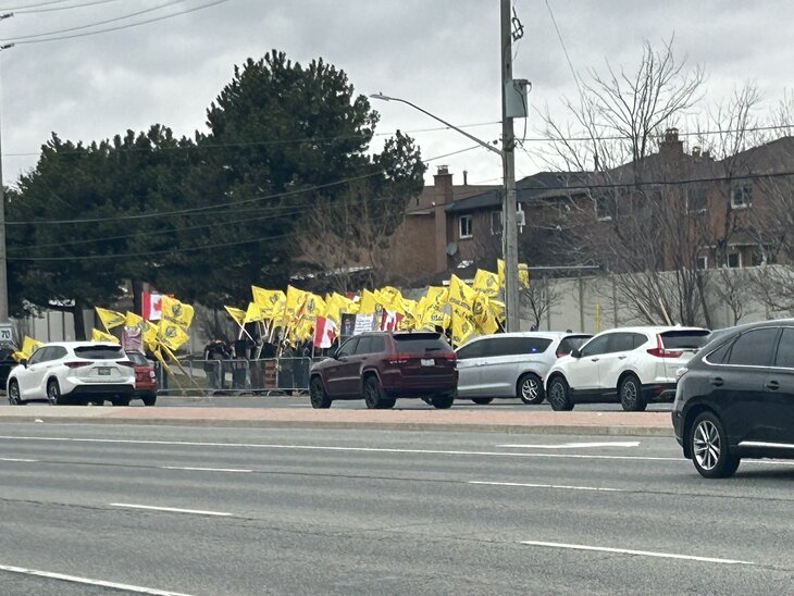 Khalistanis standing with flags outside a temple in Brampton city, Canada.