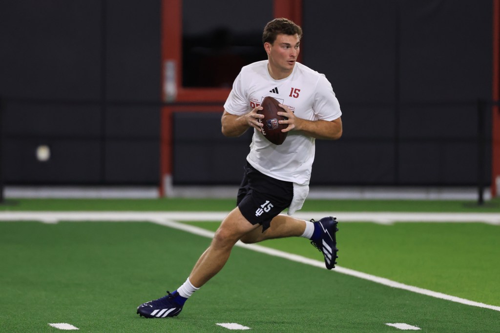 Fernando Mendoza scrambling with a football during the 2026 IU Pro Day.