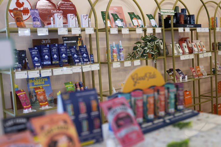 Shelves of cannabis products on display in a store