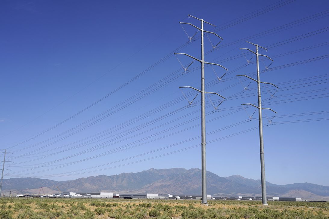 Large electrical transmission lines are routed to the newly completed Meta's Facebook data center in Eagle Mountain, Utah.