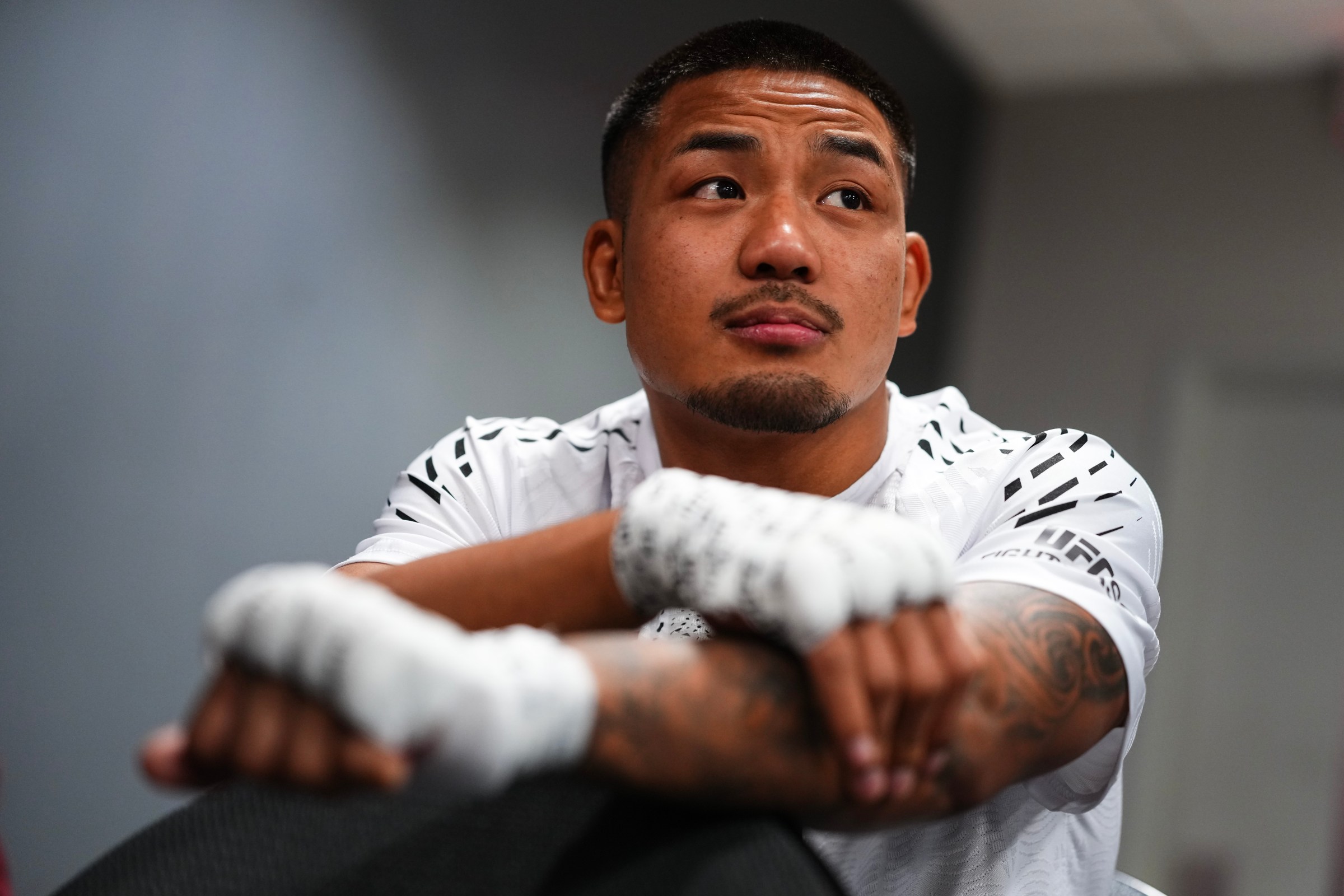 LAS VEGAS, NEVADA - DECEMBER 06: Joshua Van of Myanmar has his hands wrapped backstage during the UFC 323 event at T-Mobile Arena on December 06, 2025 in Las Vegas, Nevada. (Photo by Cooper Neill/Zuffa LLC)