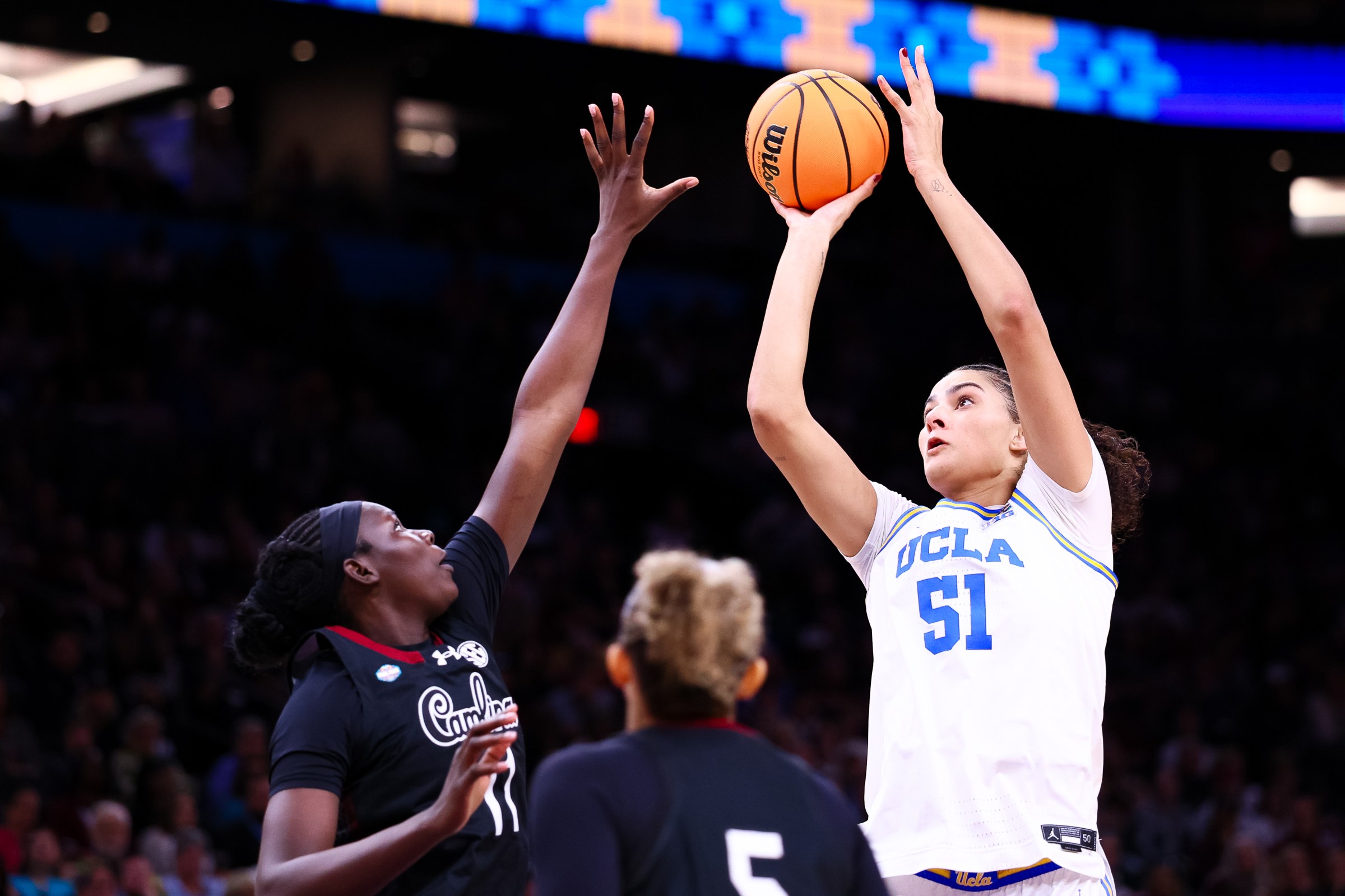 Madina Okot defends Lauren Betts.