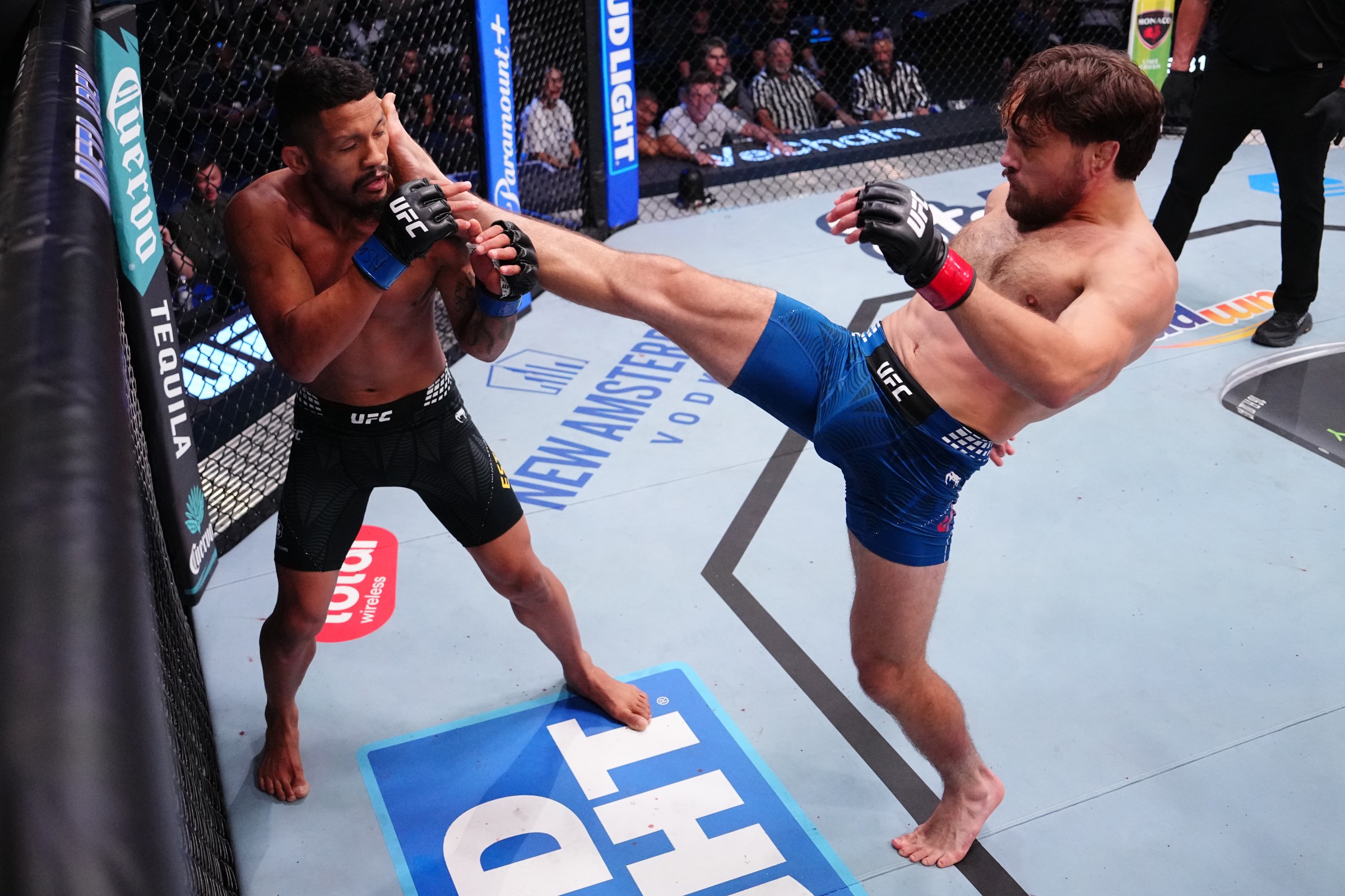 LAS VEGAS, NEVADA - APRIL 04: (R-L) Ethyn Ewing kicks Rafael Estevam of Brazil in a bantamweight fight during the UFC Fight Night event at Meta APEX on April 04, 2026 in Las Vegas, Nevada. (Photo by Jeff Bottari/Zuffa LLC)