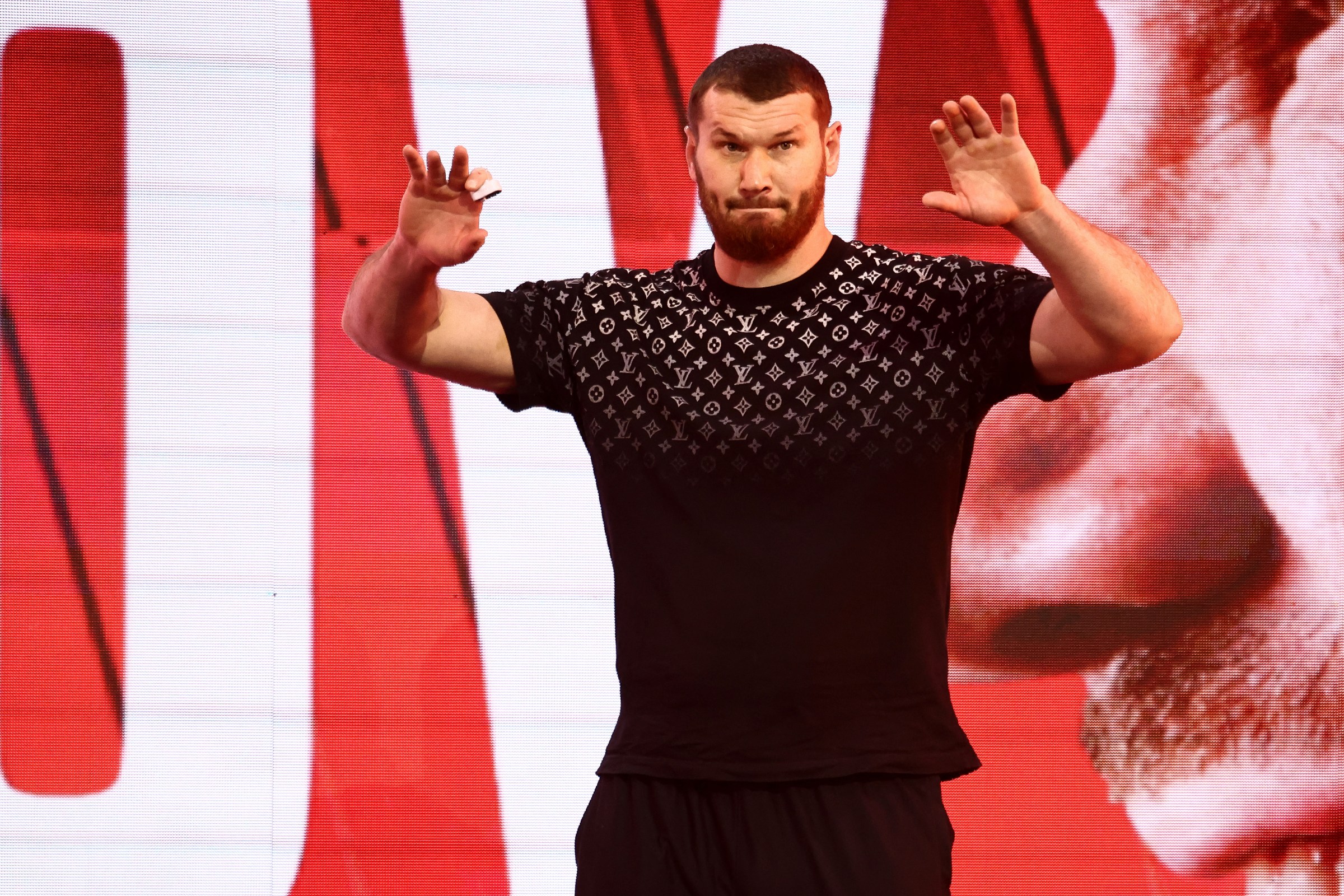 Russia’s Arslanbek Makhmudov attends a ceremonial weigh-in in central London on April 10, 2026, ahead of his heavyweight boxing match with Britain’s Tyson Fury on April 11. (Photo by Henry NICHOLLS / AFP via Getty Images)