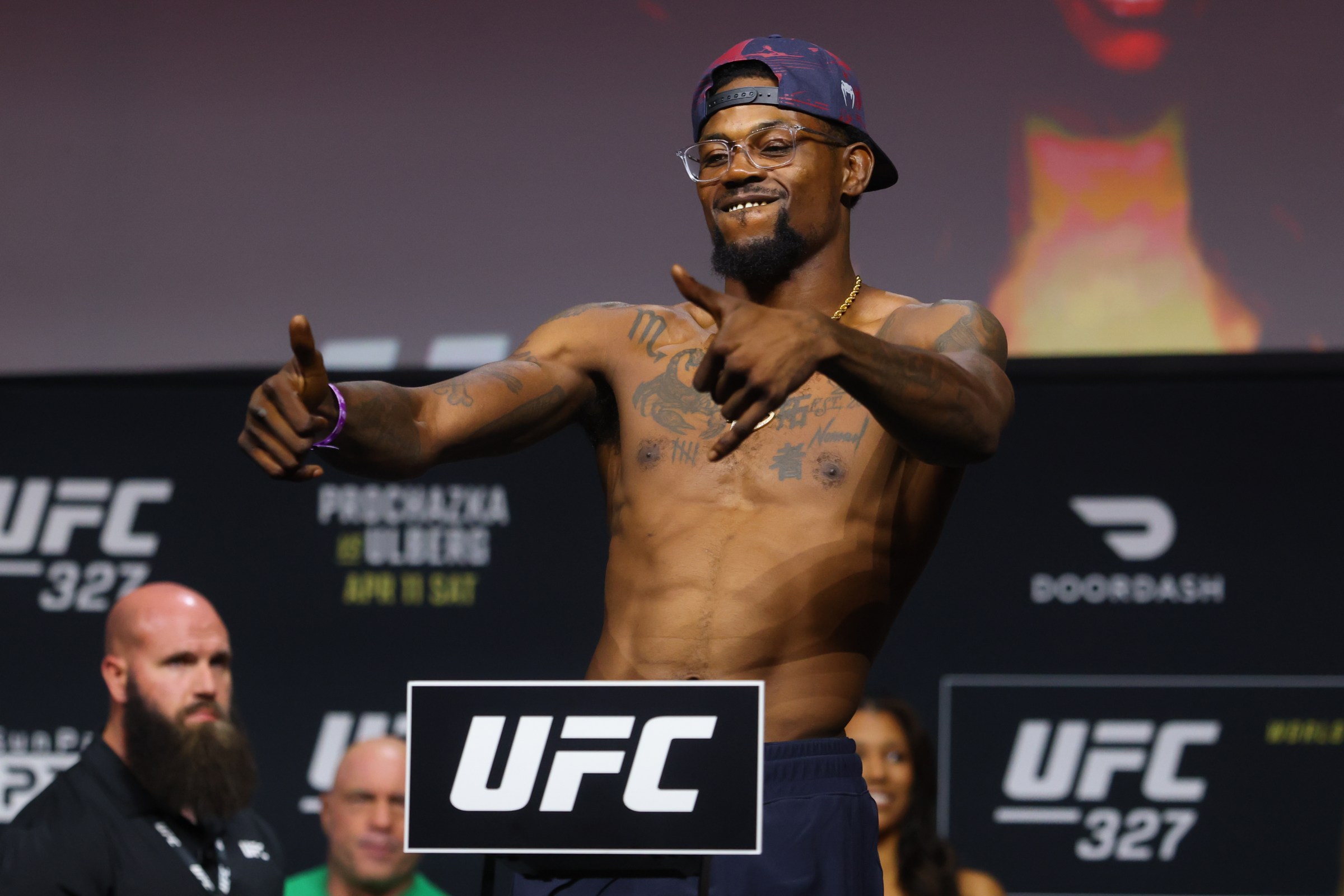 MIAMI, FLORIDA - APRIL 10: Kevin Holland poses on the scale during the UFC 327 ceremonial weigh-in at Kaseya Center on April 10, 2026 in Miami, Florida. (Photo by Ed Mulholland/Zuffa LLC)