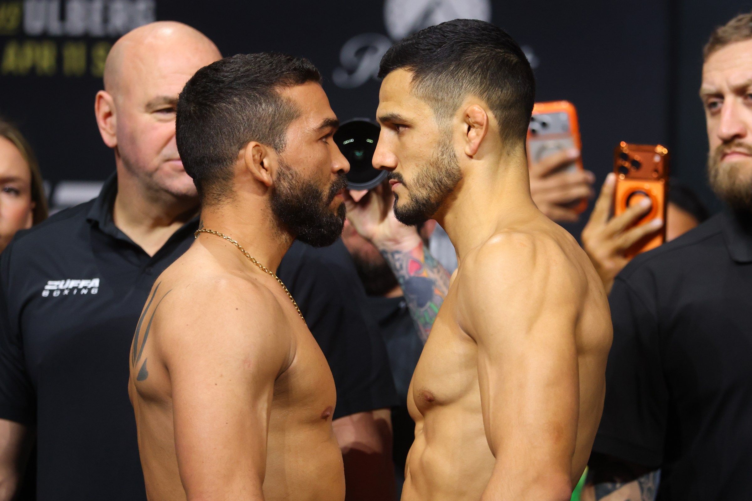MIAMI, FLORIDA - APRIL 10: (L-R) Opponents Patricio Pitbull of Brazil and Aaron Pico face off during the UFC 327 ceremonial weigh-in at Kaseya Center on April 10, 2026 in Miami, Florida. (Photo by Ed Mulholland/Zuffa LLC)