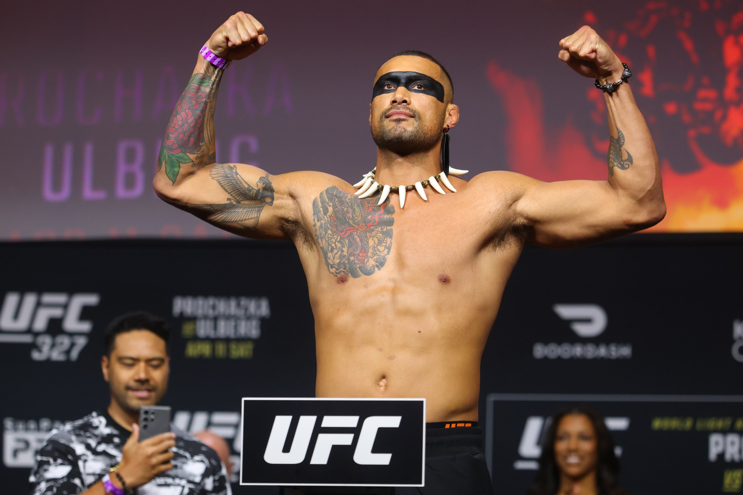 MIAMI, FLORIDA - APRIL 10: Carlos Ulberg of New Zealand poses on the scale during the UFC 327 ceremonial weigh-in at Kaseya Center on April 10, 2026 in Miami, Florida. (Photo by Ed Mulholland/Zuffa LLC)