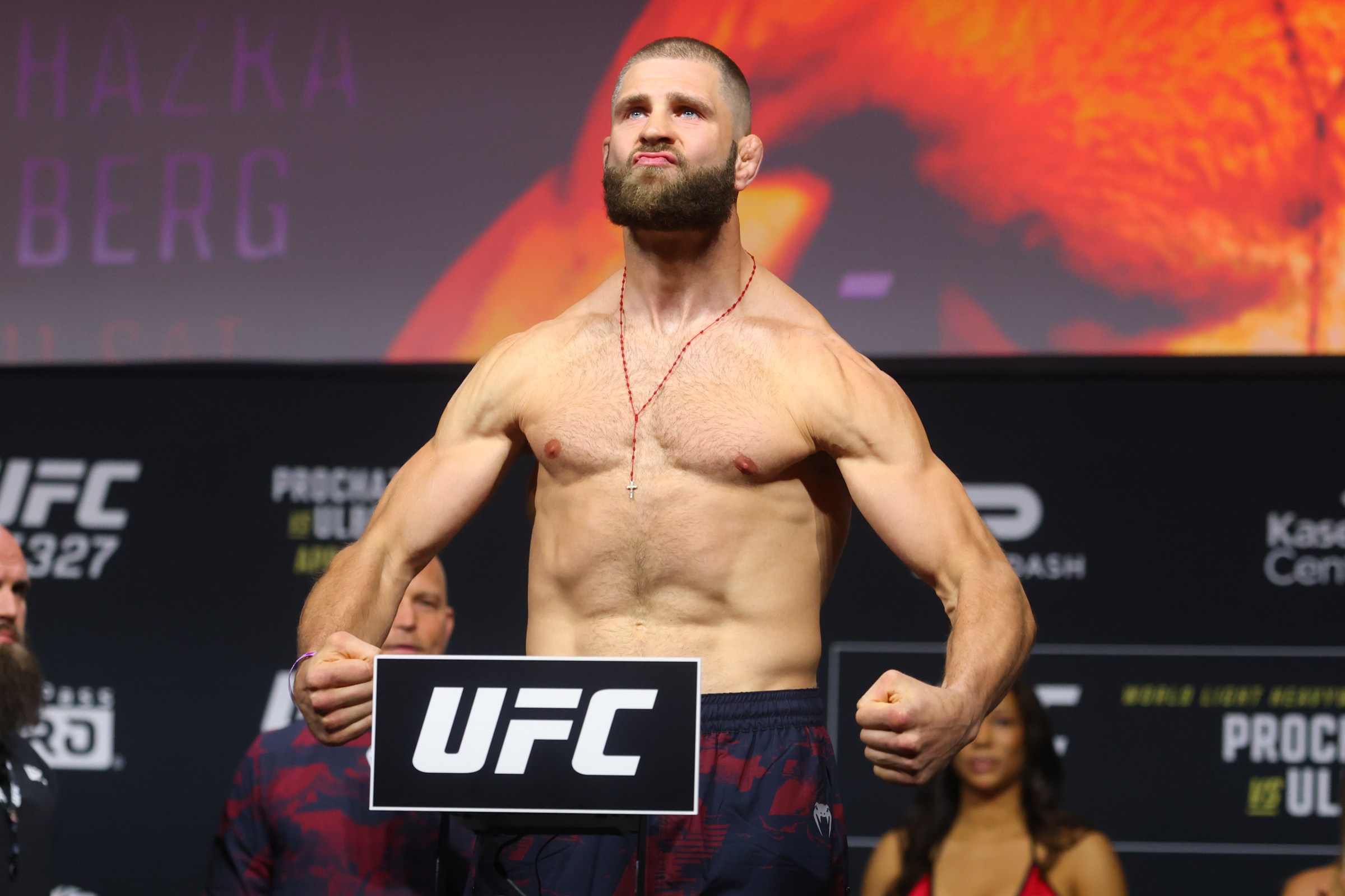 MIAMI, FLORIDA - APRIL 10: Jiri Prochazka of the Czech Republic poses on the scale during the UFC 327 ceremonial weigh-in at Kaseya Center on April 10, 2026 in Miami, Florida. (Photo by Ed Mulholland/Zuffa LLC)