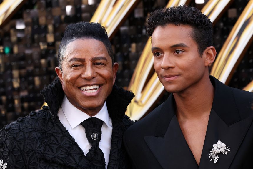 Jermaine Jackson (L) and son Jaafar attend the Los Angeles premiere of